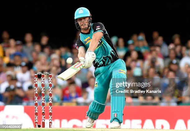 Chris Lynn of the Heat hits the ball over the boundary for a six during the Big Bash League match between the Brisbane Heat and the Perth Scorchers...