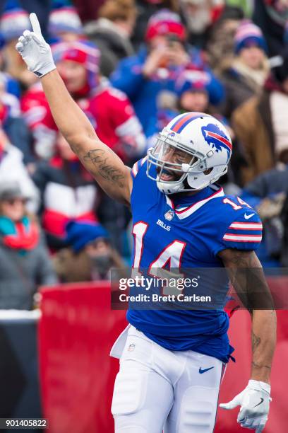 Joe Webb of the Buffalo Bills celebrates during the first quarter against the Miami Dolphins at New Era Field on December 17, 2017 in Orchard Park,...