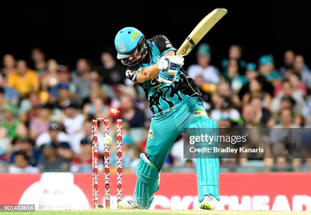 Alex Ross of the Heat is bowled by Jhye Richardson of the Scorchers during the Big Bash League match between the Brisbane Heat and the Perth...