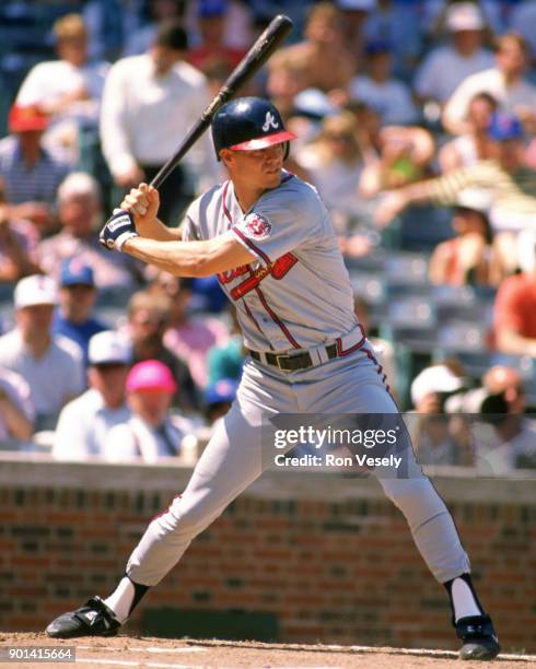 Dale Murphy of the Atlanta Braves bats during an MLB game against the Chicago Cubs at Wrigley Field in Chicago, Illinois during the 1988 season.