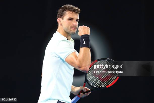 Grigor Dimitrovof of Bulgaria celebrates a point in his match against Kyle Edmund of Great Britain during day six of the 2018 Brisbane International...