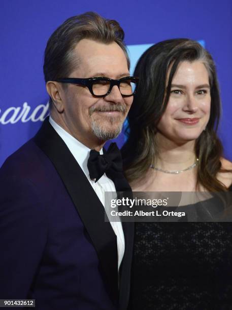 Actor Gary Oldman and Gisele Schmidt arrive for the 29th Annual Palm Springs International Film Festival Film Awards Gala held at Palm Springs...