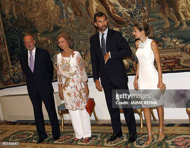 The Spanish Royal Family King Juan Carlos, Queen Sofia, Prince Felipe and Princess Letizia pose during a Summer dinner of farewell at Almudaina...
