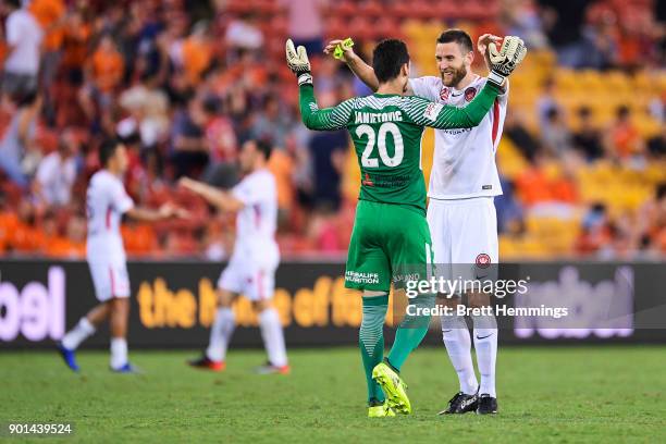 Robert Cornthwaite of the Wanderers celebrates victory with Vedran Janjetovic of the Wanderers during the round 14 A-League match between the...
