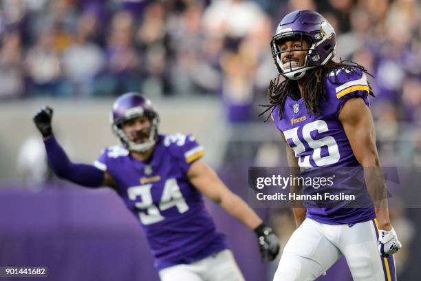 Andrew Sendejo and Trae Waynes of the Minnesota Vikings celebrate a play against the Chicago Bears during the game on December 31, 2017 at U.S. Bank...