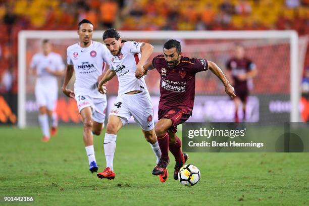 Fahid Ben Khalfallah of Brisbane runs the ball during the round 14 A-League match between the Brisbane Roar and the Western Sydney Wanderers at...