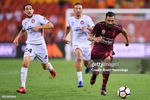 Fahid Ben Khalfallah of Brisbane runs the ball during the round 14 A-League match between the Brisbane Roar and the Western Sydney Wanderers at...