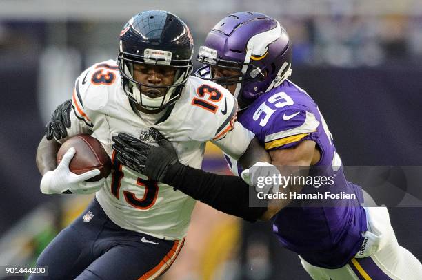 Kendall Wright of the Chicago Bears carries the ball against Danielle Hunter of the Minnesota Vikings during the game on December 31, 2017 at U.S....