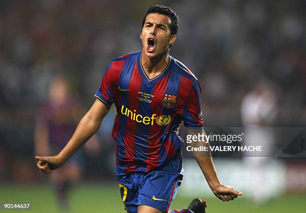 Barcelona's forward Pedro jubilates after scoring a goal during the UEFA SuperCup Europa League football match FC Barcelona vs. FC Shakhtar Donetsk,...