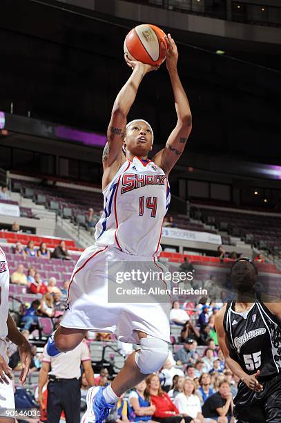 Deanna Nolan of the Detroit Shock goes up for a shot during the game against the San Antonio Silver Stars at the Palace of Auburn Hills on August 23,...