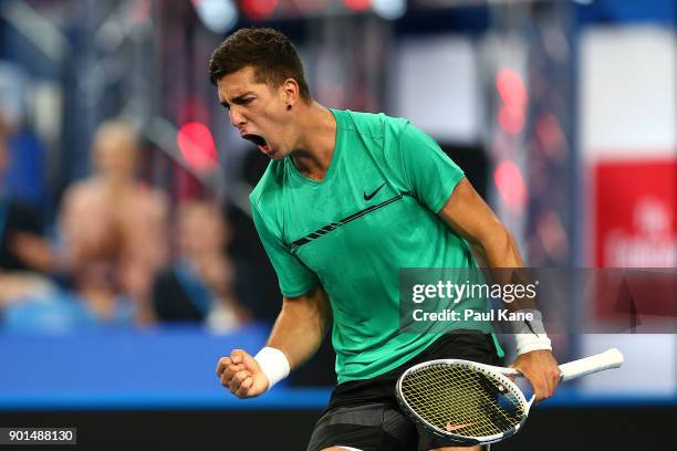 Thanasi Kokkinakis of Australia celebrates winning the tie-break in the second set in his singles match against Alexander Zverev of Germany on day...