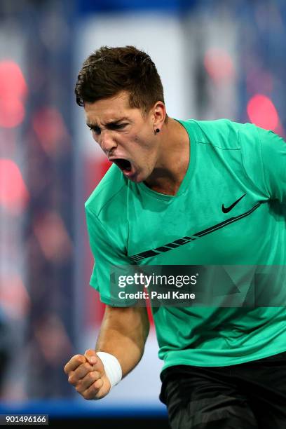 Thanasi Kokkinakis of Australia celebrates winning the tie-break in the second set in his singles match against Alexander Zverev of Germany on day...