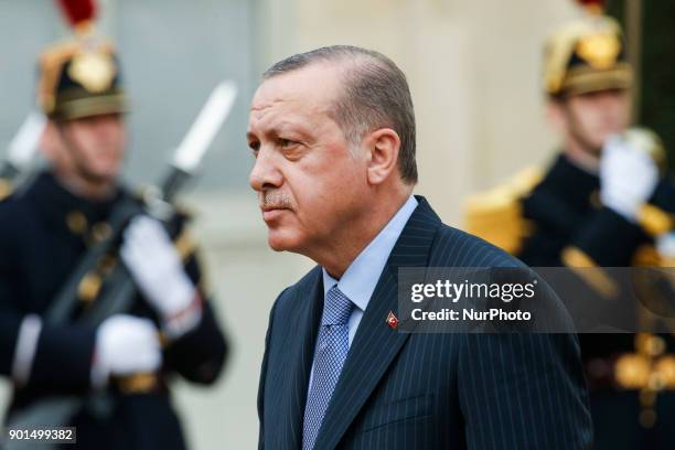 Turkish President Recep Tayyip Erdogan arrives at the Elysee palace in Paris for a meeting with his French counterpart on January 5, 2018 . Erdogan...