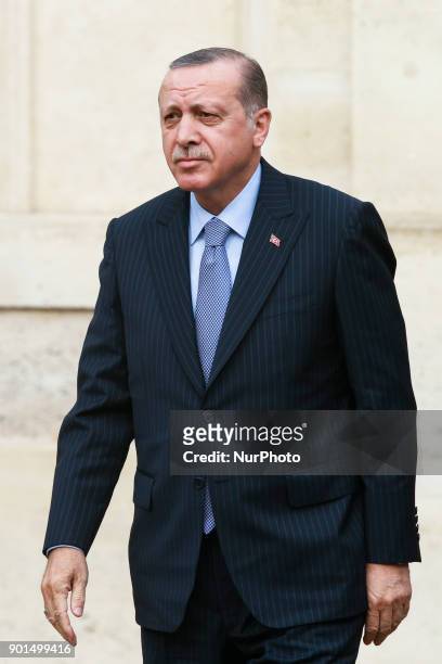 Turkish President Recep Tayyip Erdogan arrives at the Elysee palace in Paris for a meeting with his French counterpart on January 5, 2018 . Erdogan...