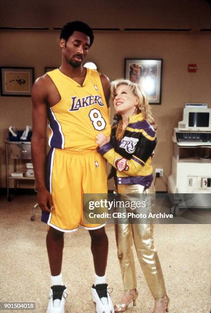 Bette Midler approaches LA Lakers basketball guard Kobe Bryant into getting her tickets to the Lakers/Knicks as a surprise for her husband's...