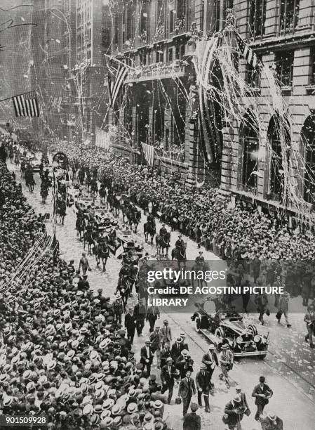 Richard Evelyn Byrd , the first man to fly over the South Pole, is celebrated by the crowd in parade with his expedition companions in New York,...