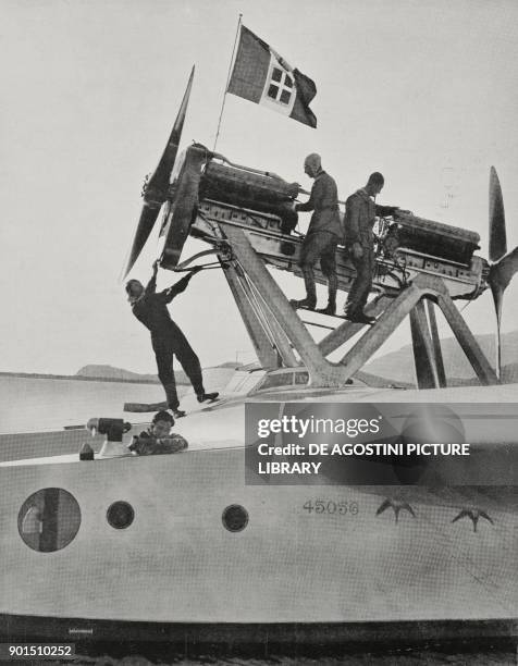 Seaplane, with the flag of the Kingdom of Italy on the propelling tower, ready to take off and fly over the Atlantic Ocean, Orbetello, Italy, photo...