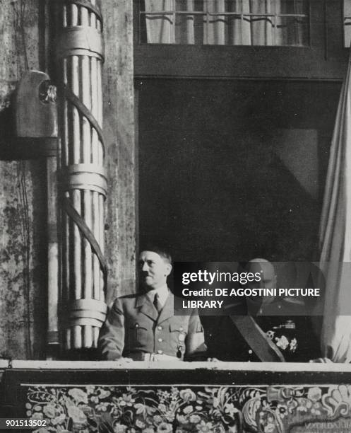 Benito Mussolini and Adolf Hitler greeting the crowd from the balcony of Palazzo Venezia, Rome, Italy, from L'Illustrazione Italiana, Year LXV, No...