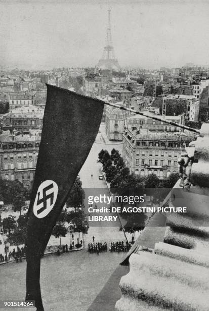 Flag with the swastika on the Arch of Triumph, June 14 Paris, France, World War II, from L'Illustrazione Italiana, Year LXVII, No 25, June 23, 1940.