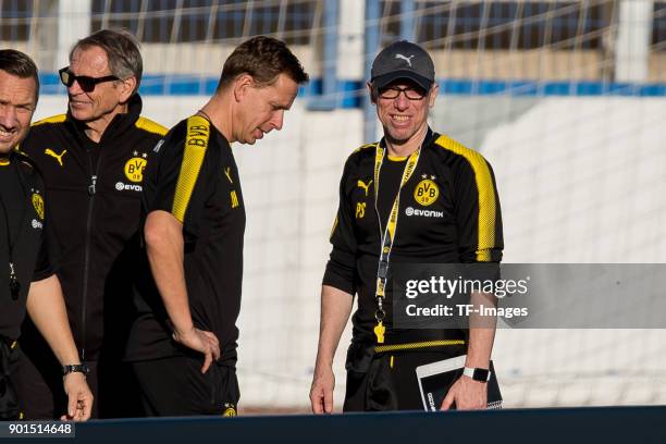Assistant coach Joerg Heinrich of Dortmund and Head coach Peter Stoeger of Dortmund look on during the Borussia Dortmund training camp at Marbella...