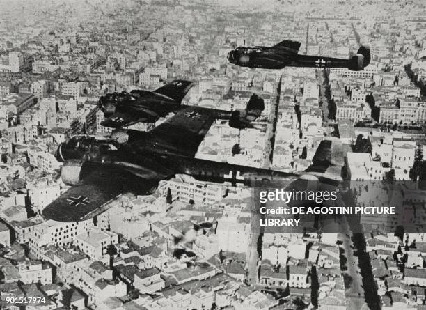 German Dornier Do 17 bombers flying over the city of Athens, Greece, World War II, from L'Illustrazione Italiana, Year LXVIII, No 20, May 18, 1941.