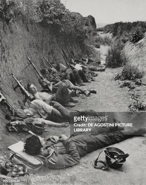 german-soldiers-resting-in-a-ditch-on-the-russian-front-world-war-ii-from-lillustrazione.jpg