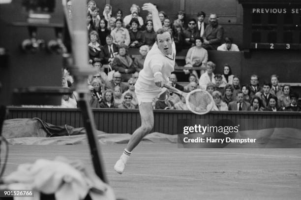 Dutch tennis player Tom Okker in action at Wimbledon, UK, 28th June 1968.