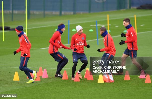 Paris Saint-Germain's Argentinian midfielder Giovanni Lo Celso, Paris Saint-Germain's French midfielder Adrien Rabiot, Paris Saint-Germain's...