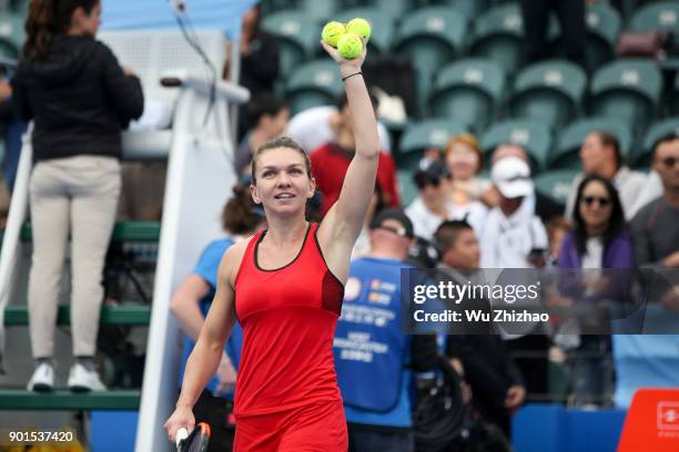 Simona Halep of Romania celebrates after winning her semi-final match against Irina-Camelia Begu of Romania on Day 6 of 2018 WTA Shenzhen Open at...