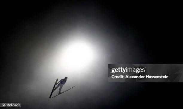 Peter Previc of Slovenia soars through the air during his qualification jump of the FIS Nordic World Cup Four Hills Tournament on January 5, 2018 in...