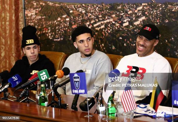 Basketball player LaMelo Ball, LiAngelo Ball and their father LaVar Ball attend a press conference in Prienai, Lithuania, where they will play for...