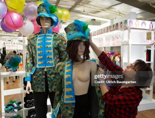 It's that time again! Carnical, the 5th season in the Rhineland, has begun. The photo shows male and female mannequins, being clothed with carnival...