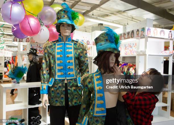 It's that time again! Carnical, the 5th season in the Rhineland, has begun. The photo shows male and female mannequins, being clothed with carnival...