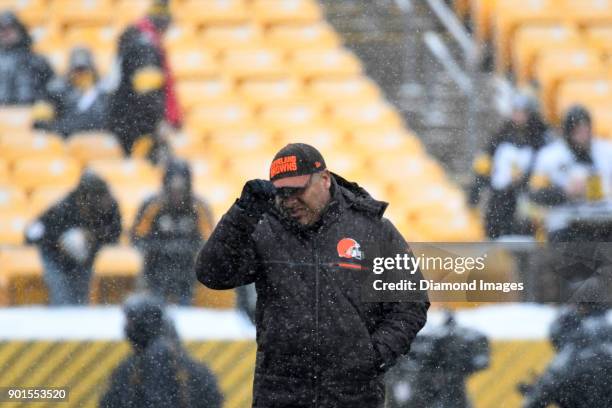 Head coach Hue Jackson of the Cleveland Browns walks onto the field prior to a game on December 31, 2017 against the Pittsburgh Steelers at Heinz...