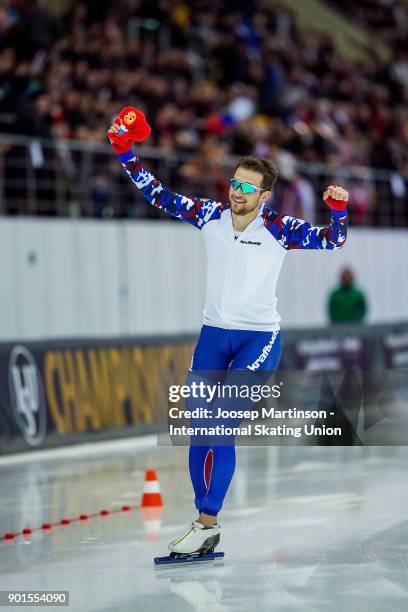 Denis Yuskov of Russia celebrates in the Men's 1500m during the European Speed Skating Championships at the Moscow Region Speed Skating Centre...