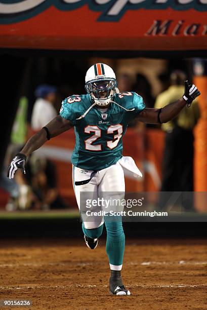 Ronnie Brown of the Miami Dolphins is introduced before the game against the Carolina Panthers during a preseason game at Land Shark Stadium on...