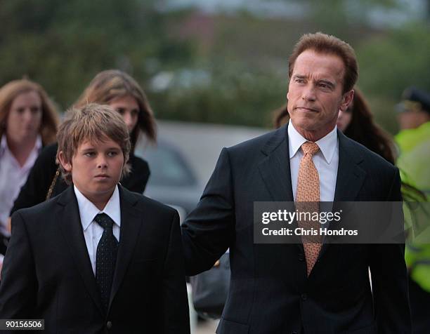 California Gov. Arnold Schwarzenegger arrives with members of his family at a memorial for U.S. Sen. Edward Kennedy at the John F. Kennedy...