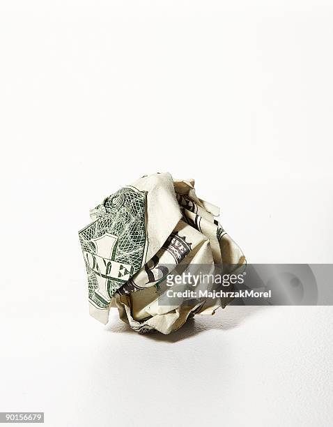 us dollar bill crumpled into a ball - crumpling stock pictures, royalty-free photos & images