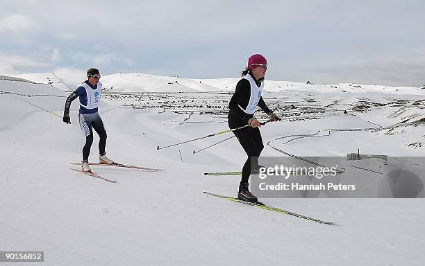 Andrea Fancy of New Zealand and Sarah Murphy of New Zealand compete in the Winter triathlon during day eight of the Winter Games NZ at the Snow Farm...