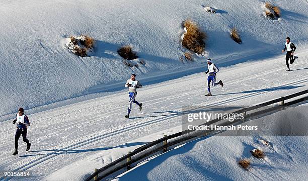 Gavin Mason of New Zealand, Ben Koons of New Zealand John-Paul Lilburne of New Zealand and Nat Anglem of New Zealand compete in the Winter triathlon...