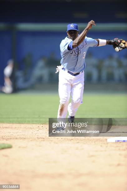 Shortstop Yuniesky Betancourt of the Kansas City Royals fields his position as he throws to first base after catching a ground ball during the game...