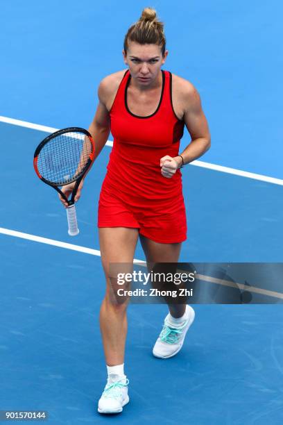 Simona Halep of Romania celebrates a shot during the semi final match against Irina-Camelia Begu of Romania during Day 6 of 2018 WTA Shenzhen Open at...