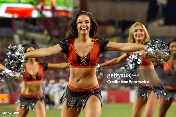 The Bucs cheerleaders perform during the second half of an NFL game between the New Orleans Saints and the Tampa Bay Buccaneers on December 31 at...