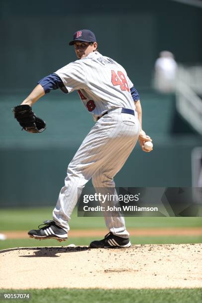 Carl Pavano of the Minnesota Twins pitches during the game against the Kansas City Royals at Kauffman Stadium in Kansas City, Missouri on Sunday,...