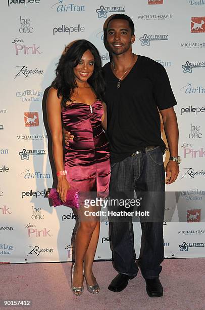 Tifany Hines and Christian Keyes arrive on the red carpet at the Celebrity Catwalk's 9th Annual Fashion Show on August 27, 2009 in Los Angeles,...