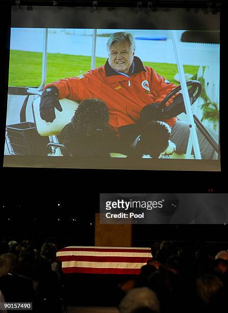Video presentation appears on a large screen during a memorial for U.S. Sen. Edward Kennedy at the John F. Kennedy Library August 28, 2009 in Boston,...