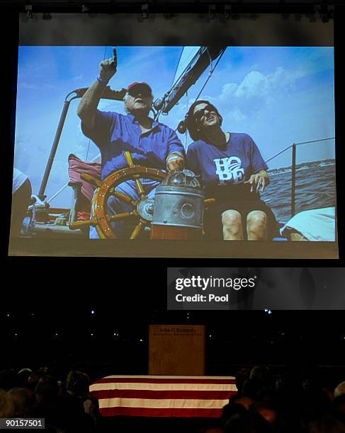 Video presentation appears on a large screen during a memorial for U.S. Sen. Edward Kennedy at the John F. Kennedy Library August 28, 2009 in Boston,...