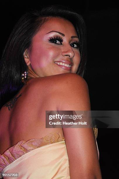 Alexia Lei walks the catwalk at the Celebrity Catwalk's 9th Annual Fashion Show on August 27, 2009 in Los Angeles, California.