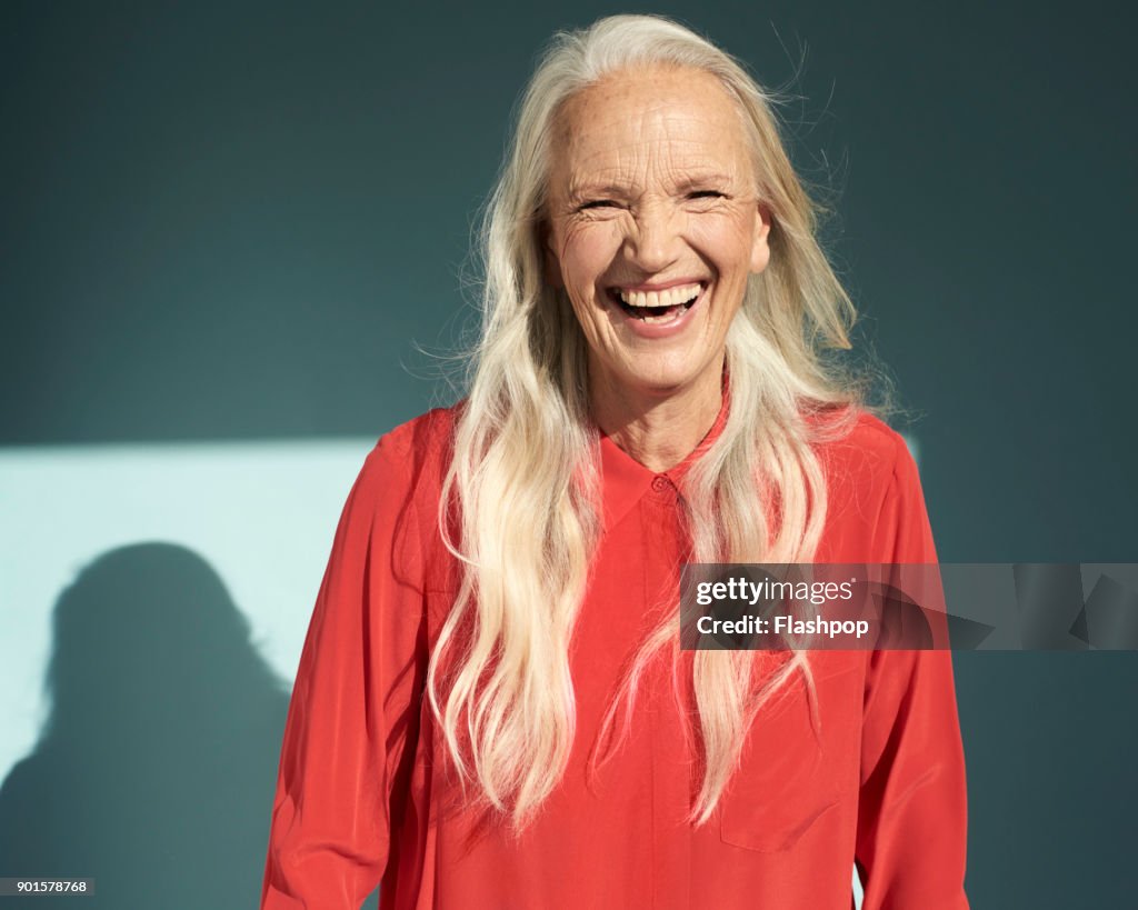 Portrait of mature woman laughing