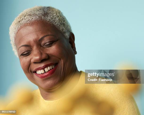 portrait of confident mature woman - portrait and selective focus stock pictures, royalty-free photos & images